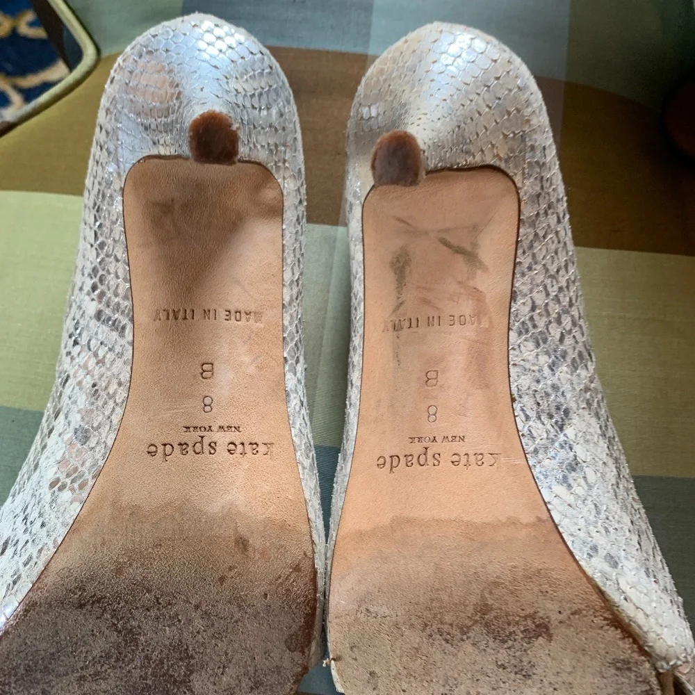 Kate soade silver bow shoes. Worn about 5 times. Mark’s on bottom but great conf